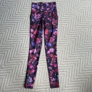 Athleta salutation stash pocket II printed tights size XXS
